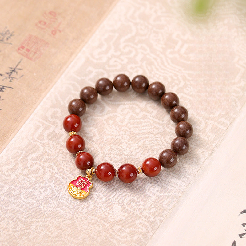 Ambergris & Goose Pear Scented Beads Paired with South Red Agate Wristlet